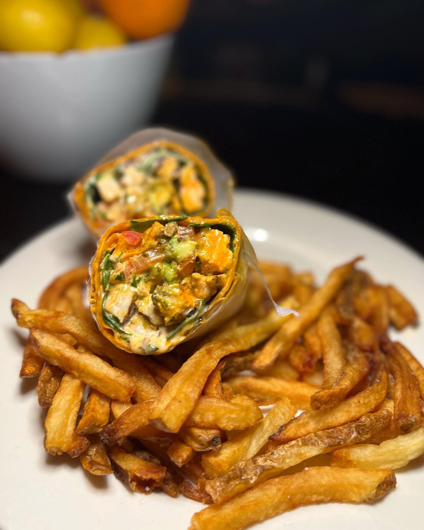 Who doesn&rsquo;t love a wrap?? Our Buffalo Chicken Wrap hits the spot baby! Crispy chicken breast tossed w. our house made buffalo sauce, avocado, ranch, greens and pico de gallo in a sun dried tomato wrap (say that five times fast). Nomitty nom nom